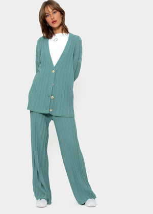 Flowing knitted trousers with ribbed structure - green
