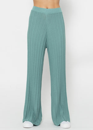 Flowing knitted trousers with ribbed structure - green