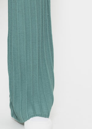 Flowing knitted trousers with ribbed structure - green
