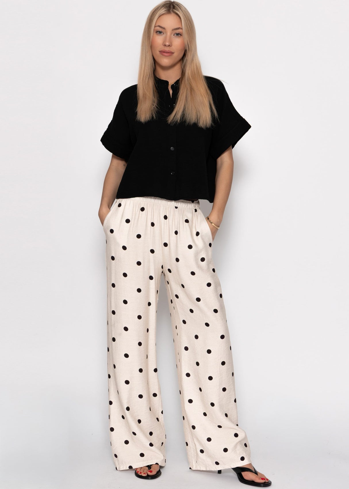 Gepunktete Hose mit weitem Bein - hellbeige