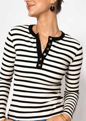 Gestreiftes Langarmshirt mit Knopfleiste - schwarz-weiß