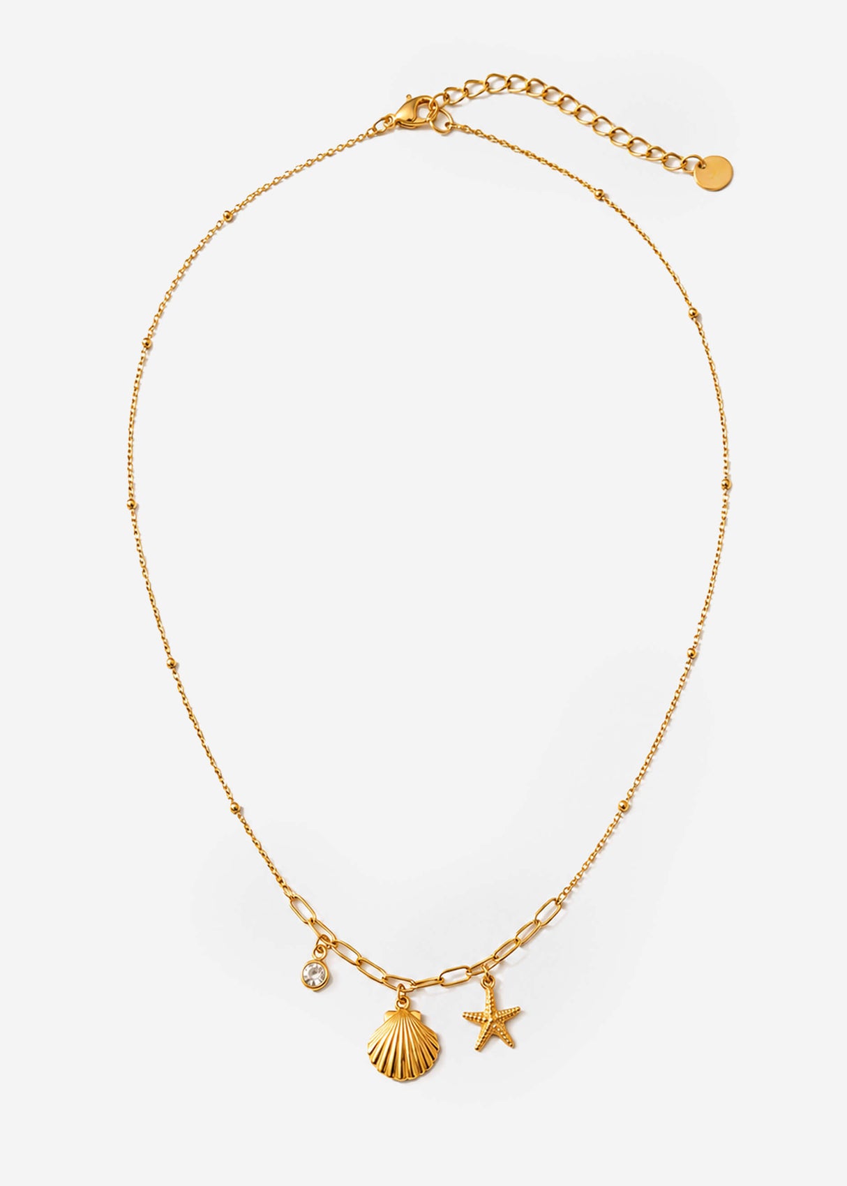 Halskette mit maritimen Anhängern und Glitzerstein - gold