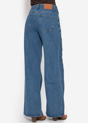 High-waisted jeans with diagonal zipper - blue
