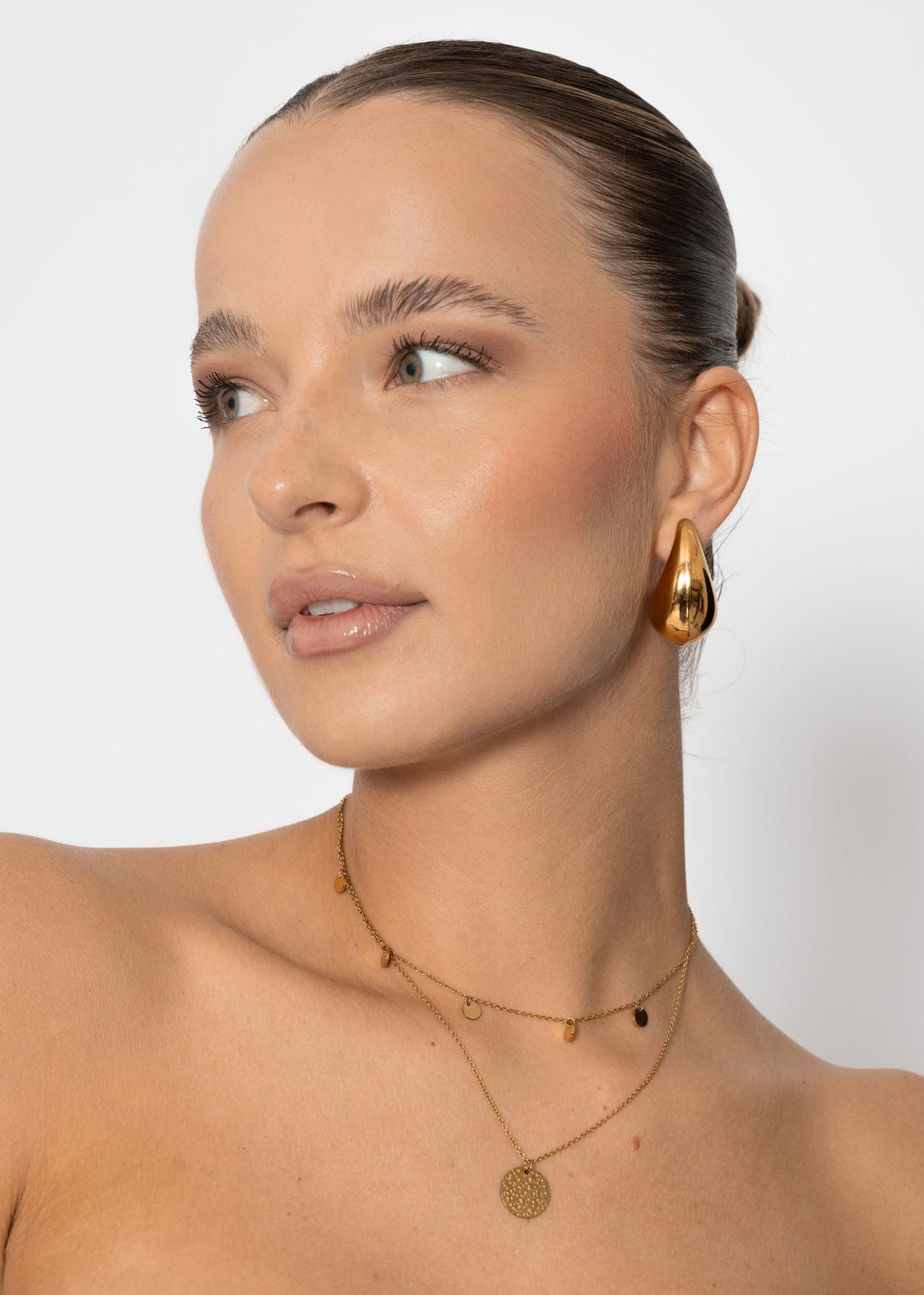 Kombinierte Kette mit Anhänger und zarten Plättchen, gold