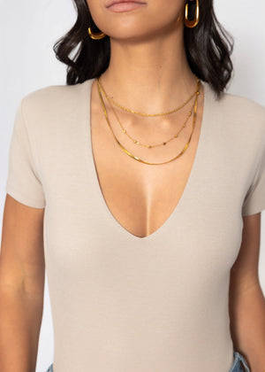 Short sleeve bodysuit with V-neck - beige