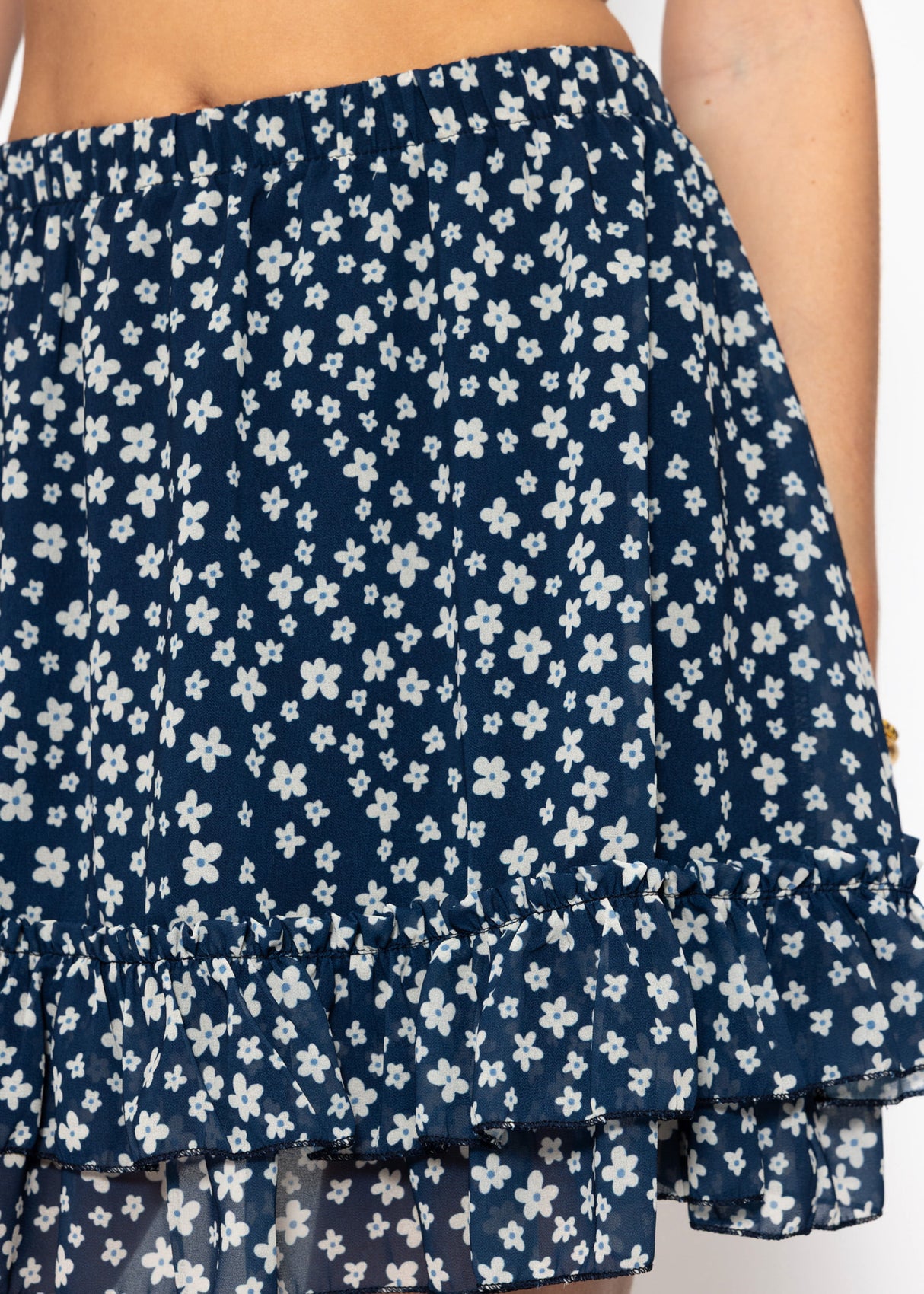 Kurzer Volant-Rock und floralem Druck - blau
