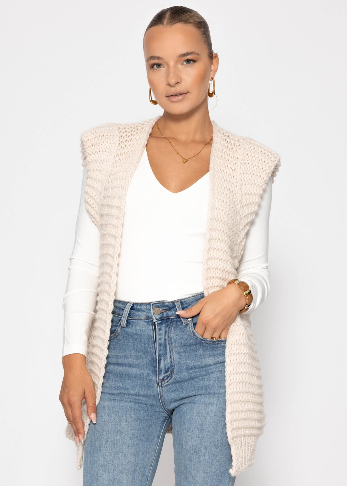 Long sleeveless knitted vest with structured shoulders - offwhite