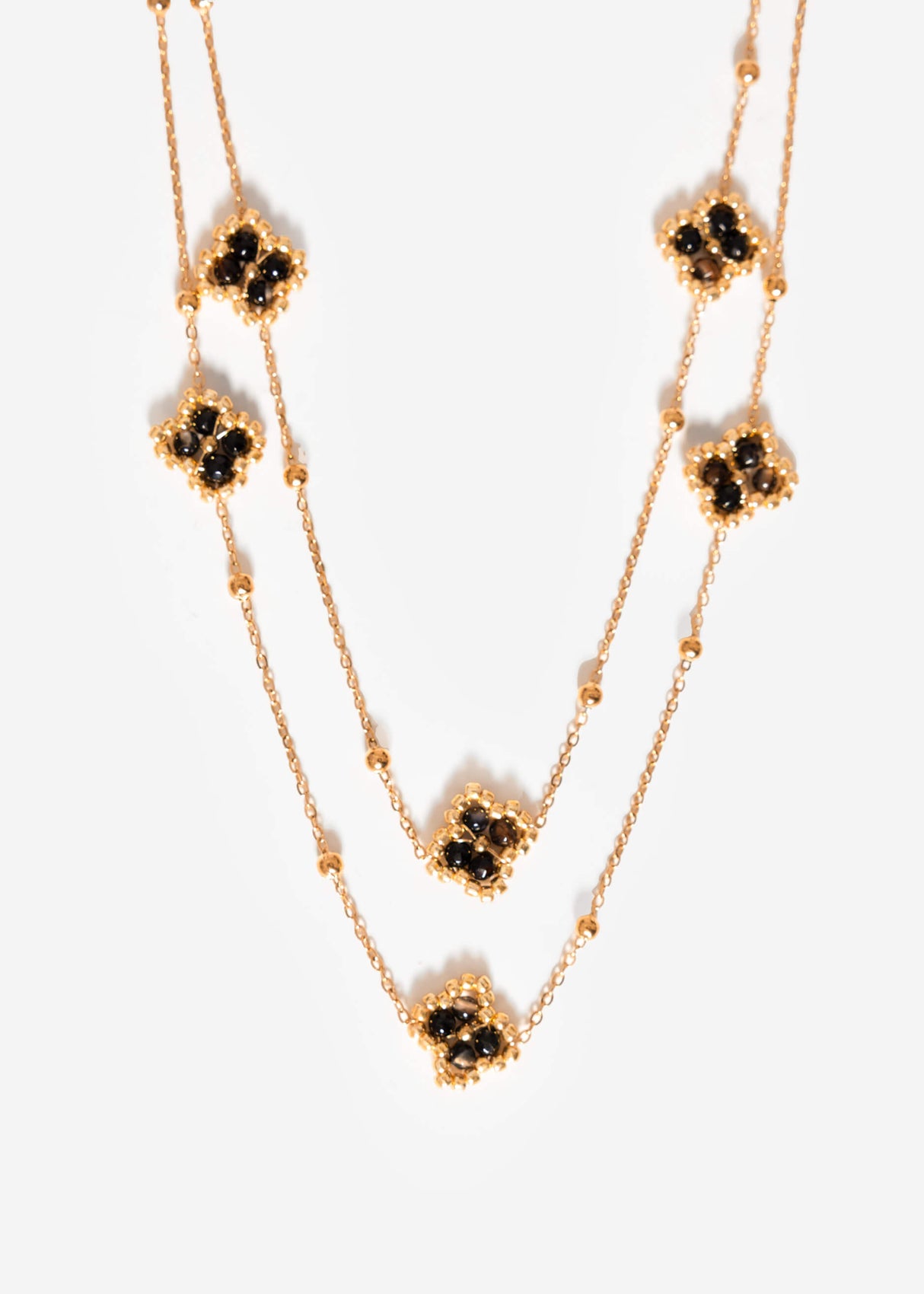 Layering necklace with clover leaves - gold