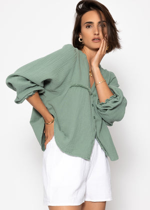 Muslin blouse with V-neck and fringes - sage green
