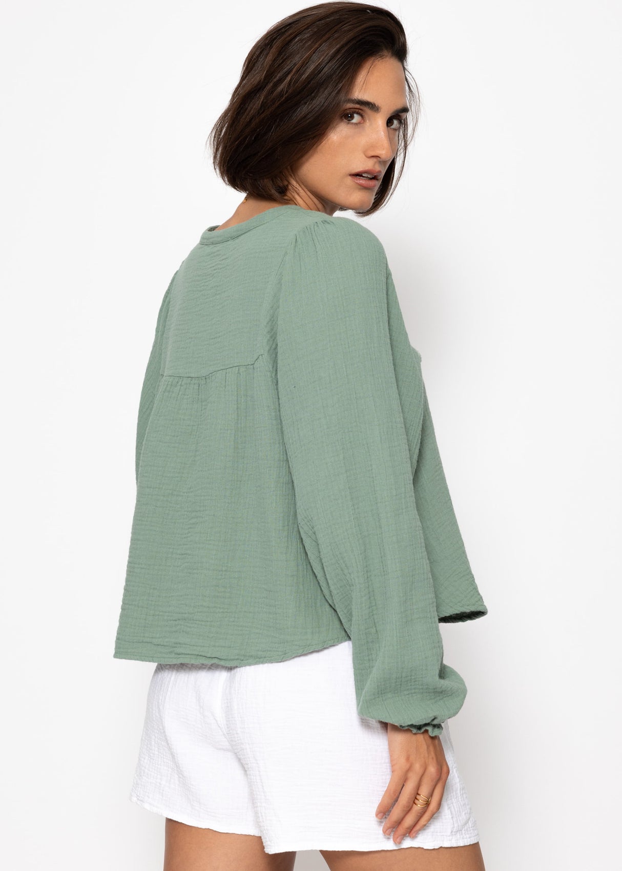 Muslin blouse with V-neck and fringes - sage green