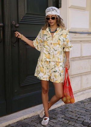 Musselin Shorts mit Lemon-Print - gelb