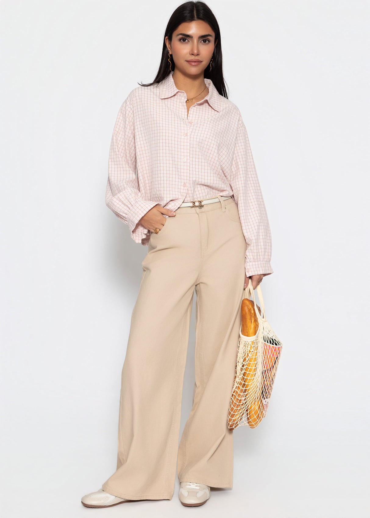 Oversized blouse with a check pattern - pink