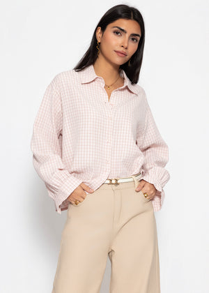 Oversized blouse with a check pattern - pink