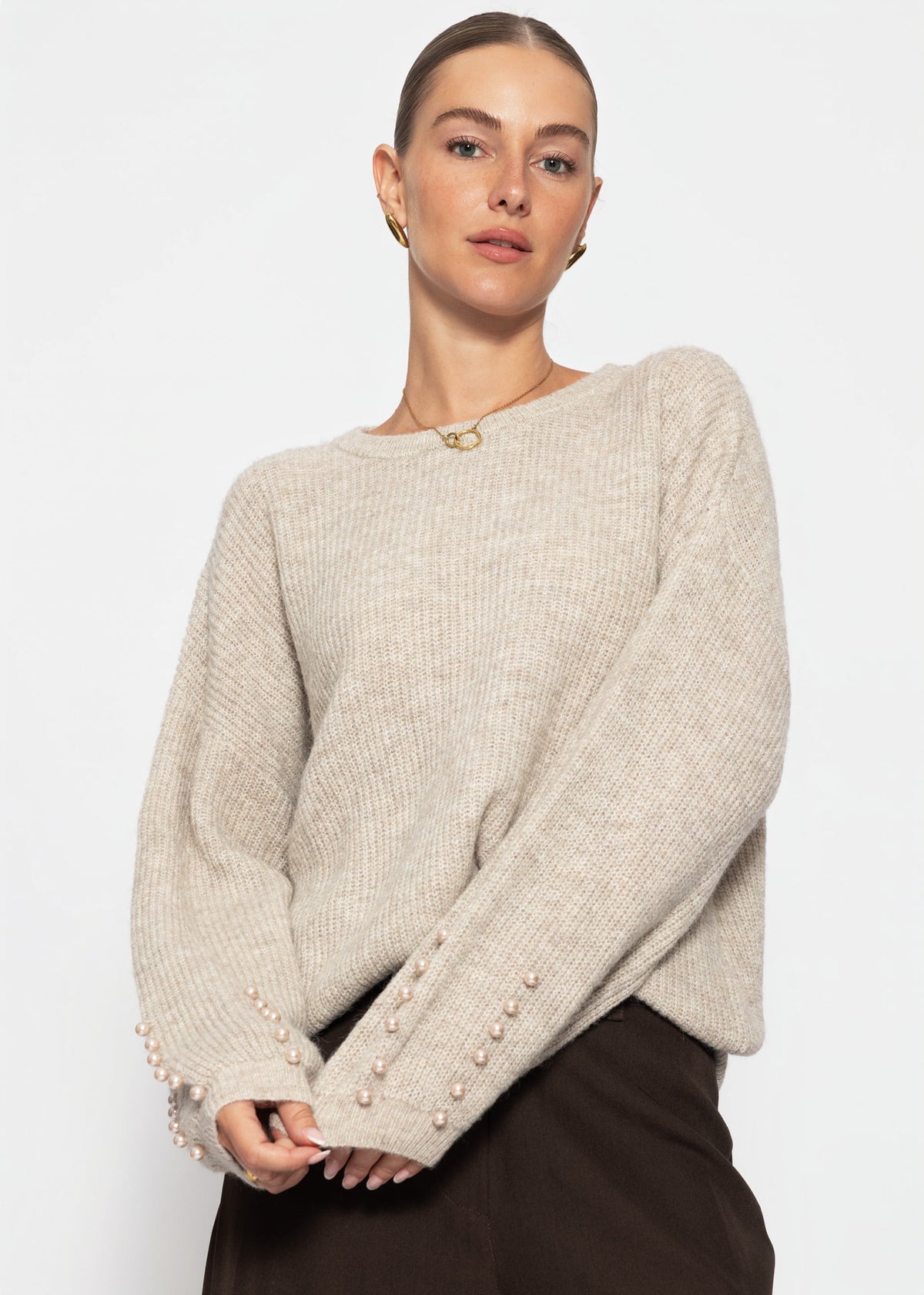 Pullover mit Perlendetails - beige