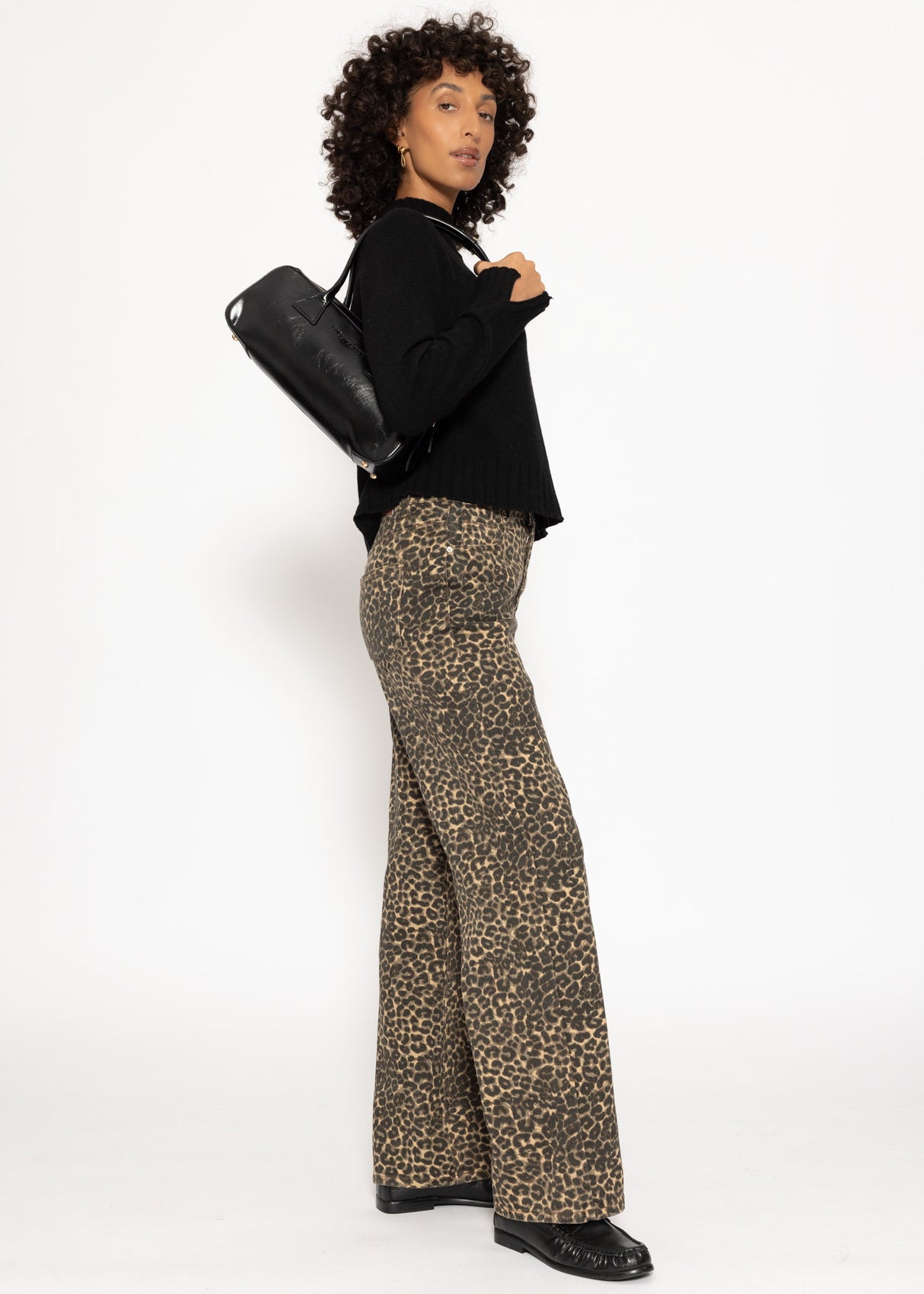 Sweater with stand-up collar and sleeve slits - black