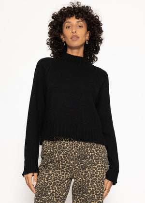 Sweater with stand-up collar and sleeve slits - black
