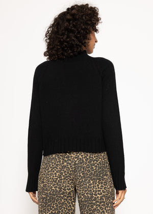 Sweater with stand-up collar and sleeve slits - black