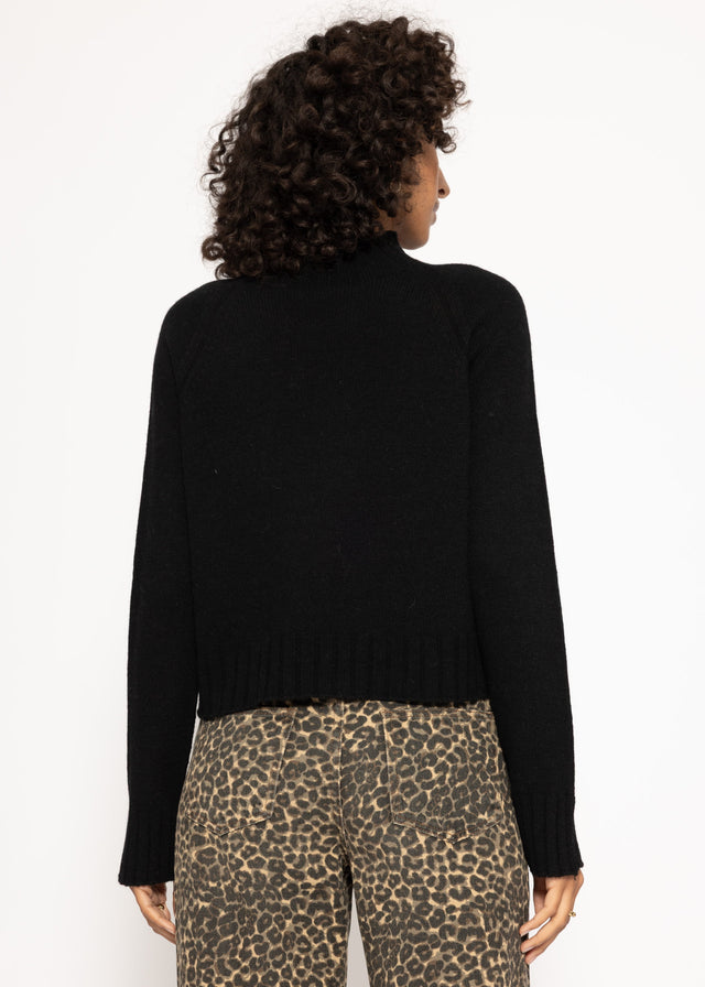 Pullover mit Stehkragen und Ärmelschlitzen - schwarz
