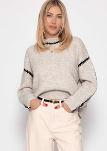 Sweater with decorative stitching - beige