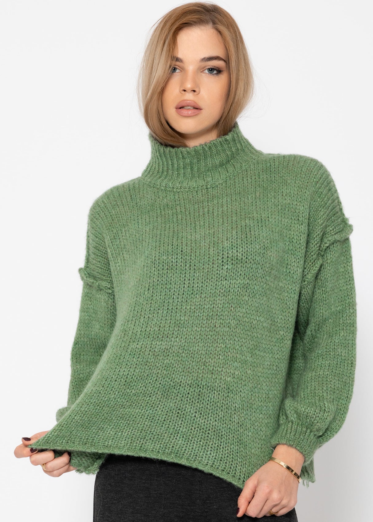 Turtleneck sweater with external seams - sage green