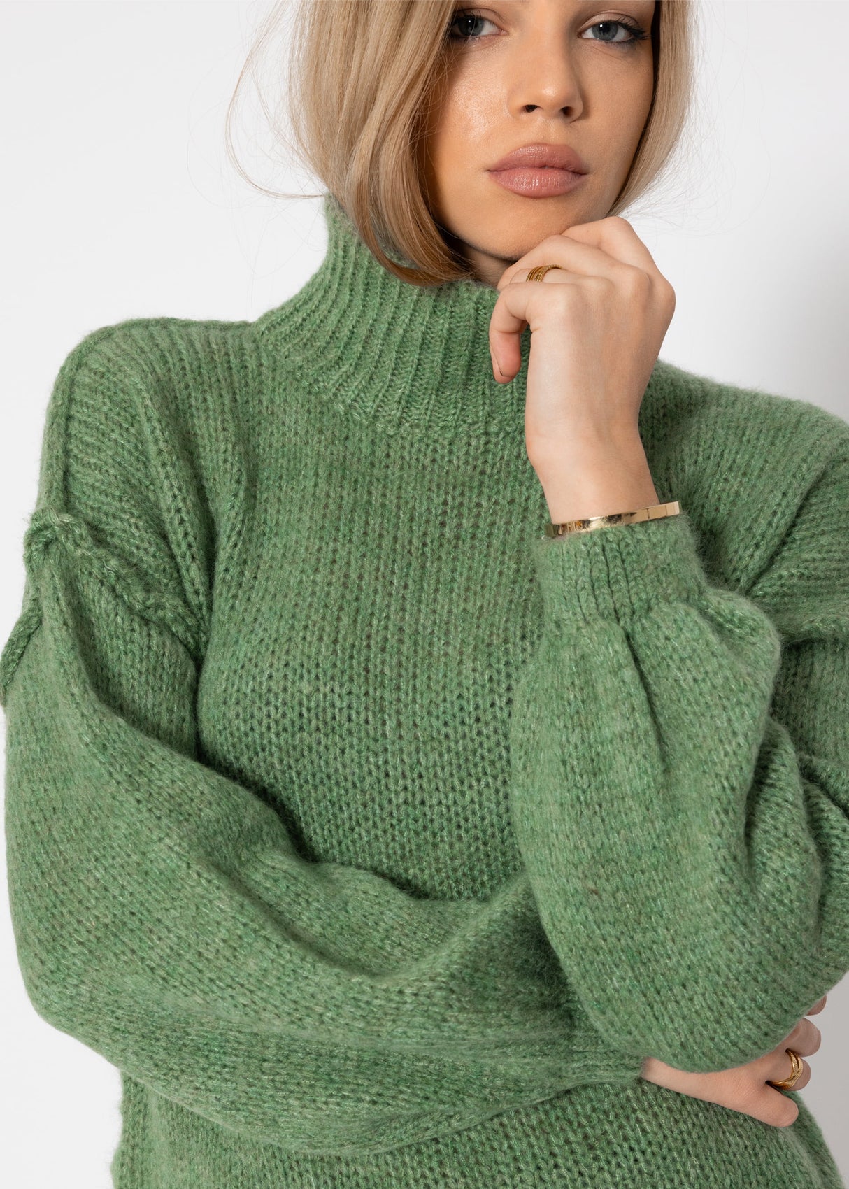 Turtleneck sweater with external seams - sage green
