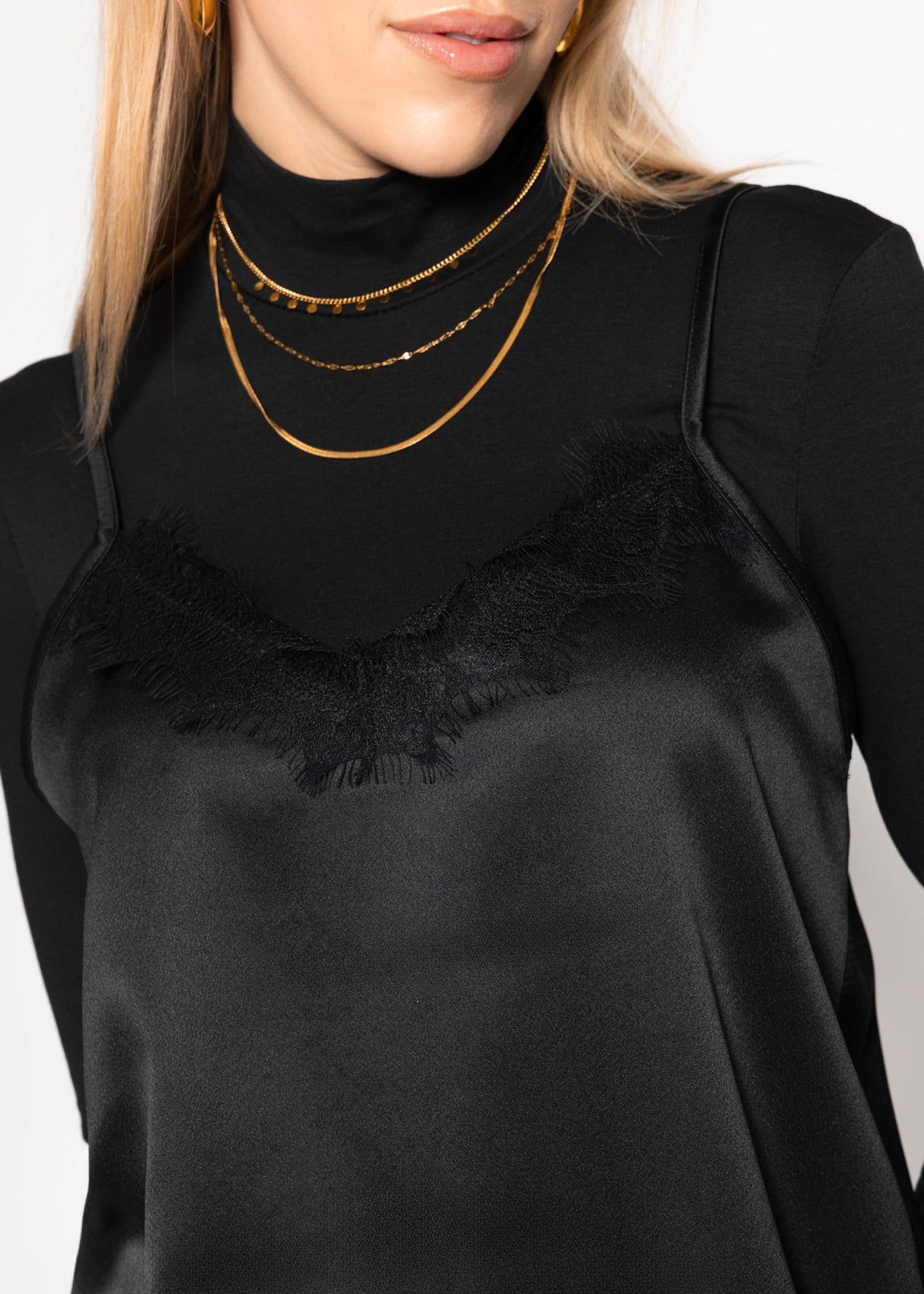 Satin top with lace and asymmetrical hem - black