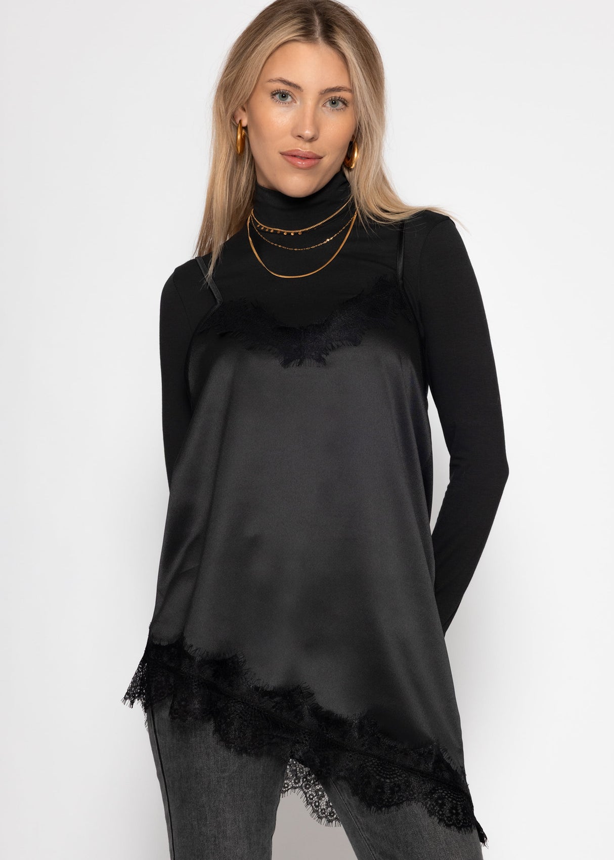 Satin top with lace and asymmetrical hem - black