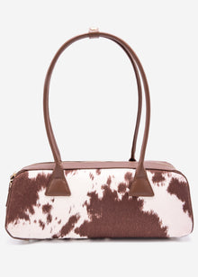 Shoulder bag made of synthetic leather with cow print - brown