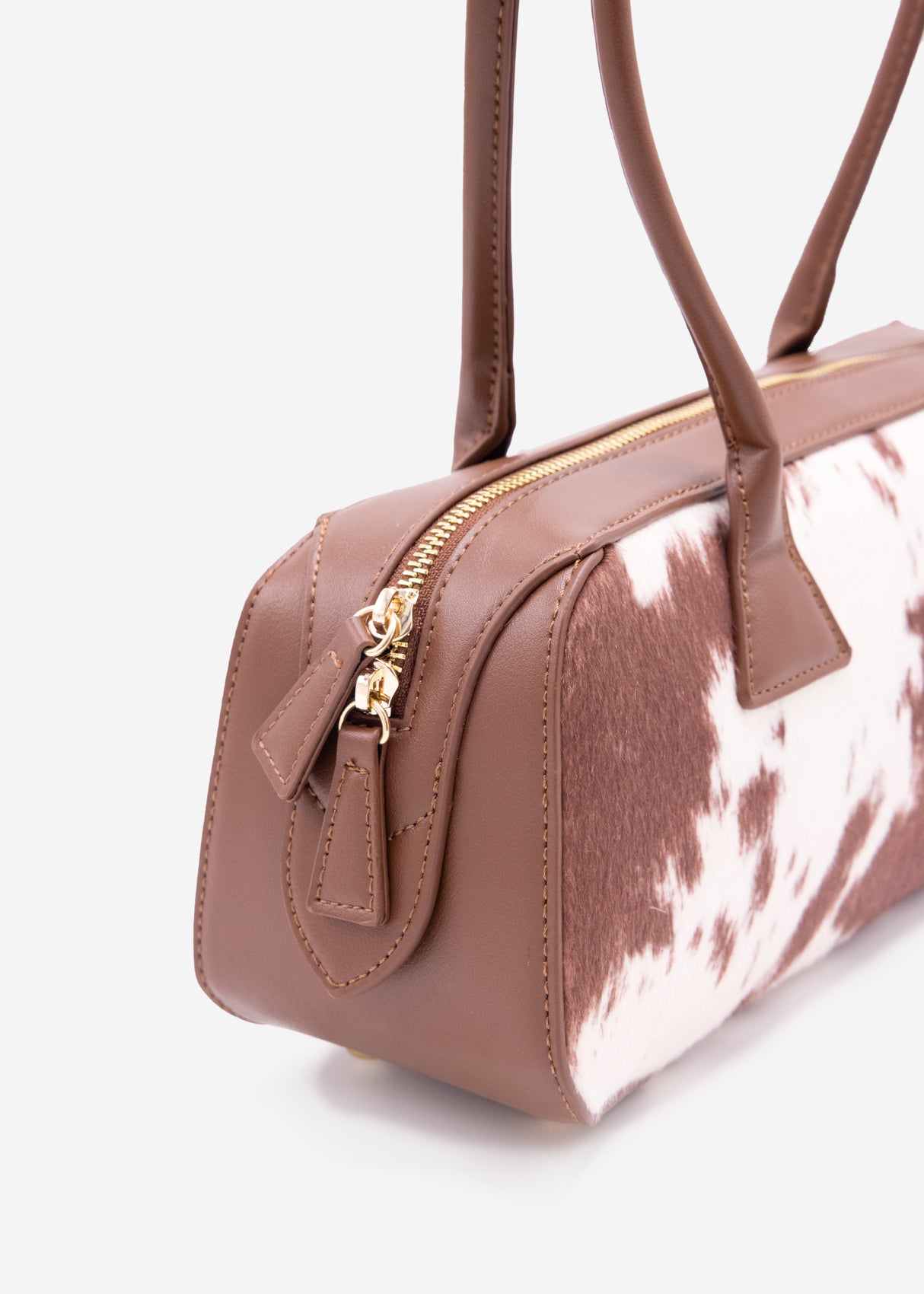 Shoulder bag made of faux leather with cow print - brown