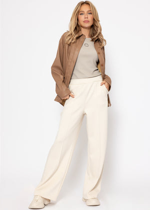 Soft wide jogging pants with piping - off-white