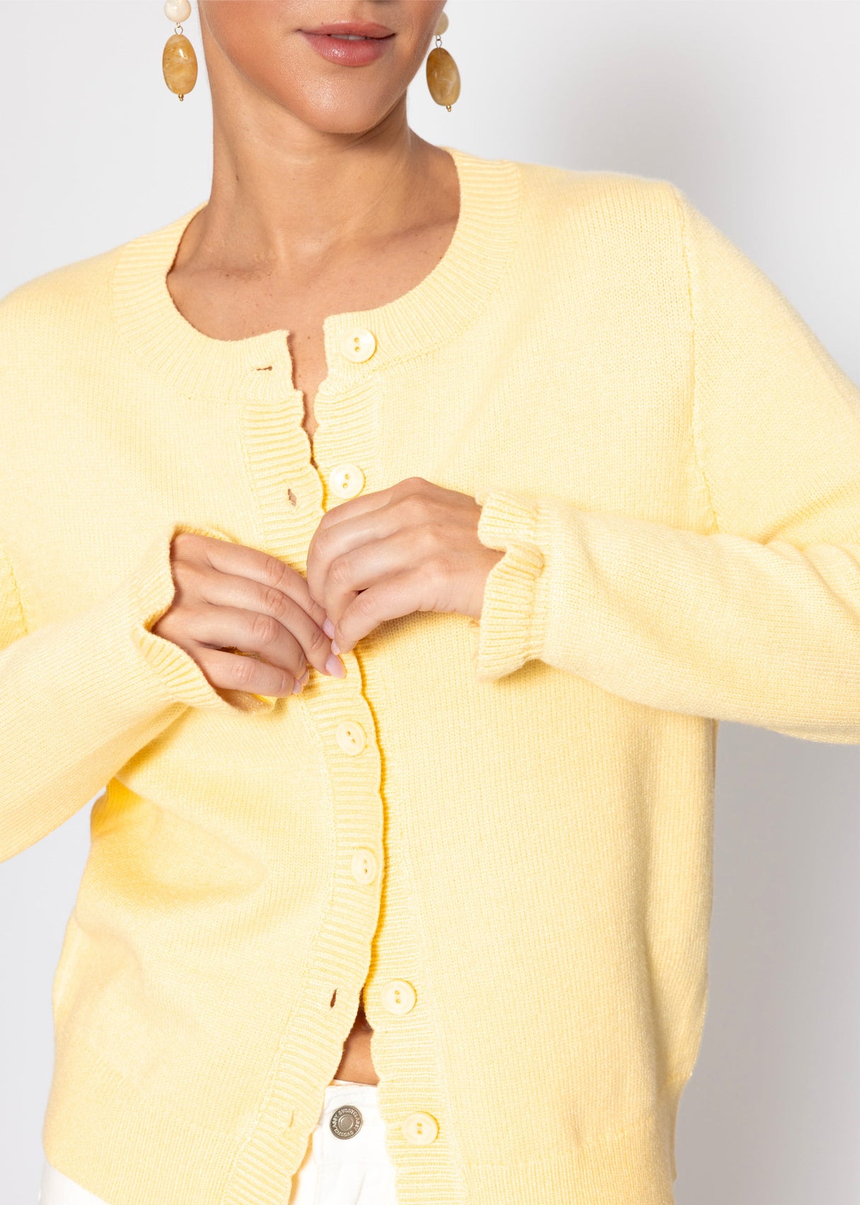 Strickjacke mit Volants - buttergelb