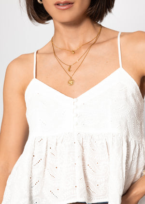 Top with flounce and eyelet embroidery - white