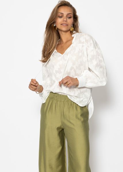 Slightly transparent jacquard blouse with tie detail