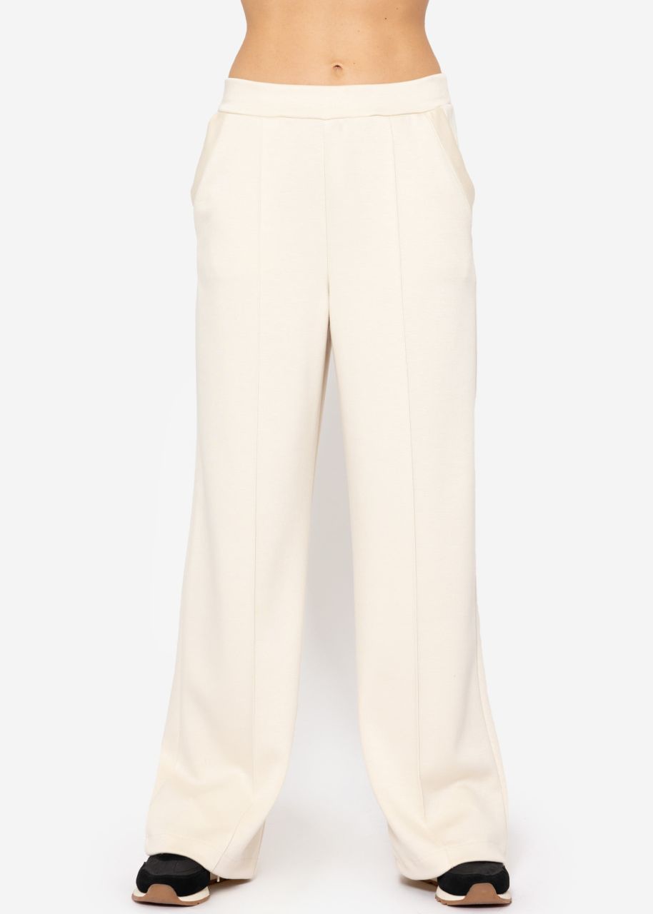 Soft, wide jogging trousers with piping - offwhite