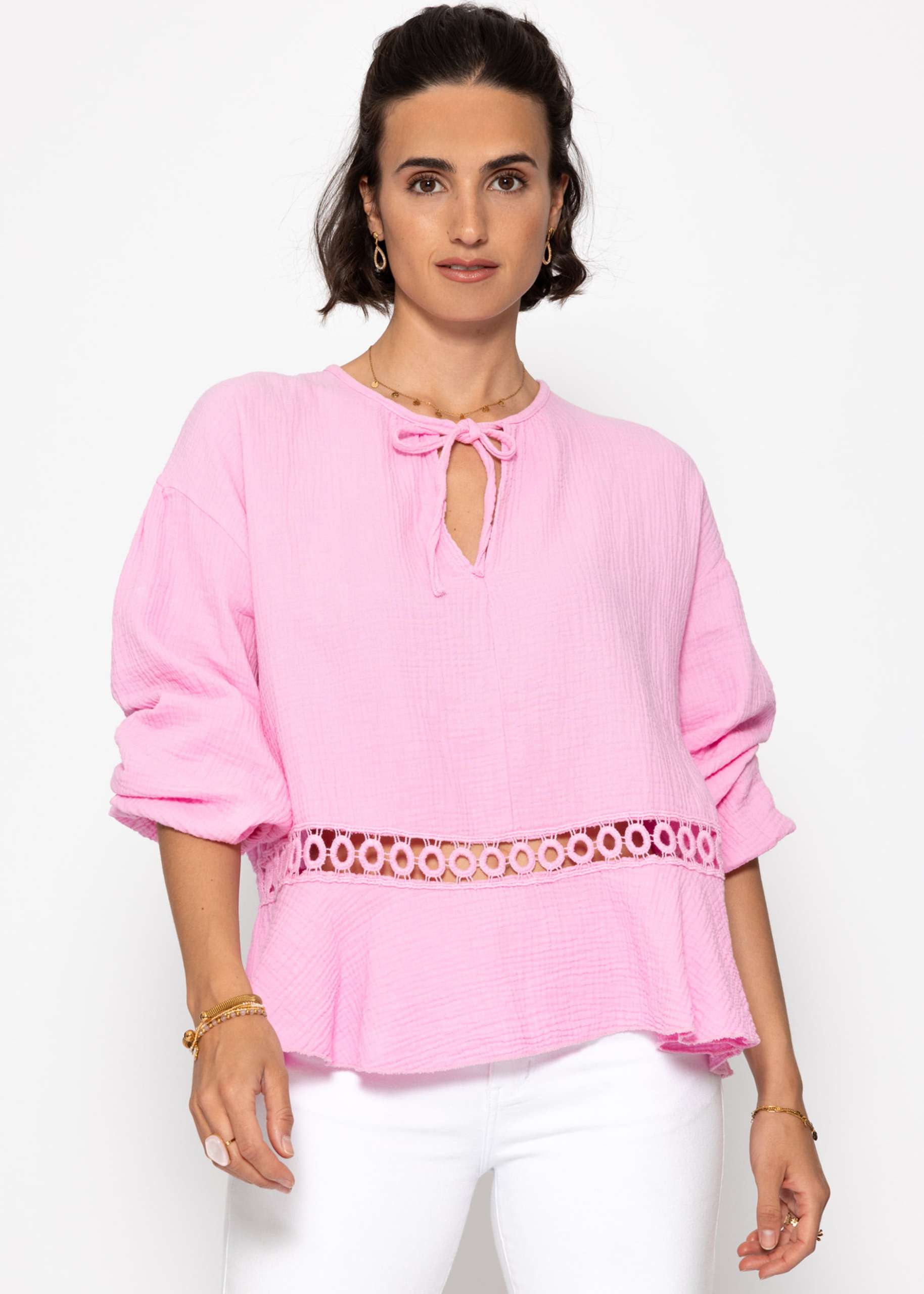 Muslin blouse with peplum in pink