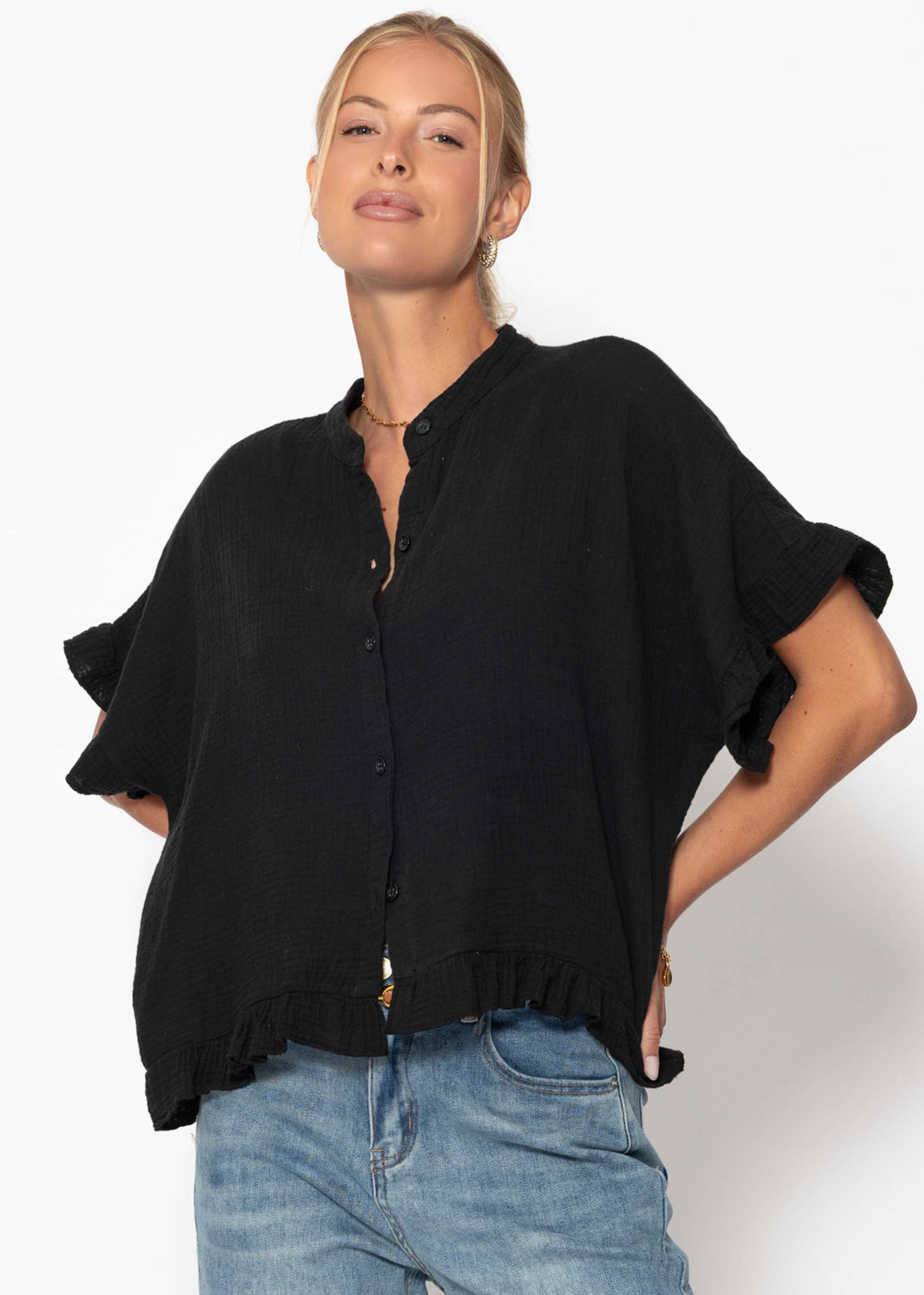 Muslin blouse with ruffle hem - black
