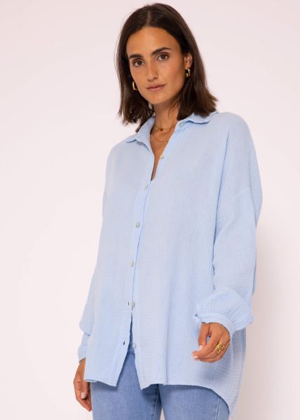 Muslin blouse with rounded hem, light blue