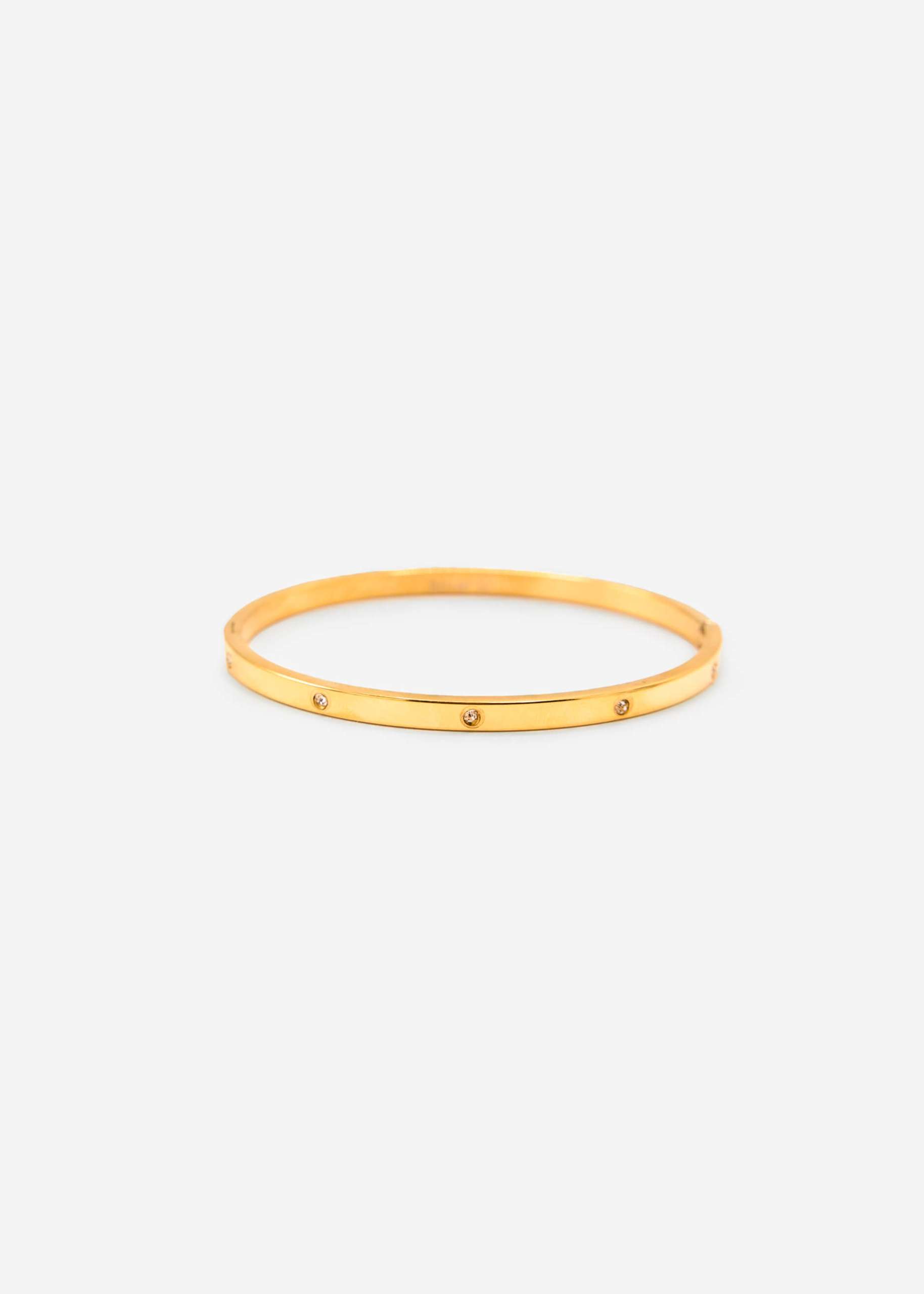 Bangle with glittering stones - gold