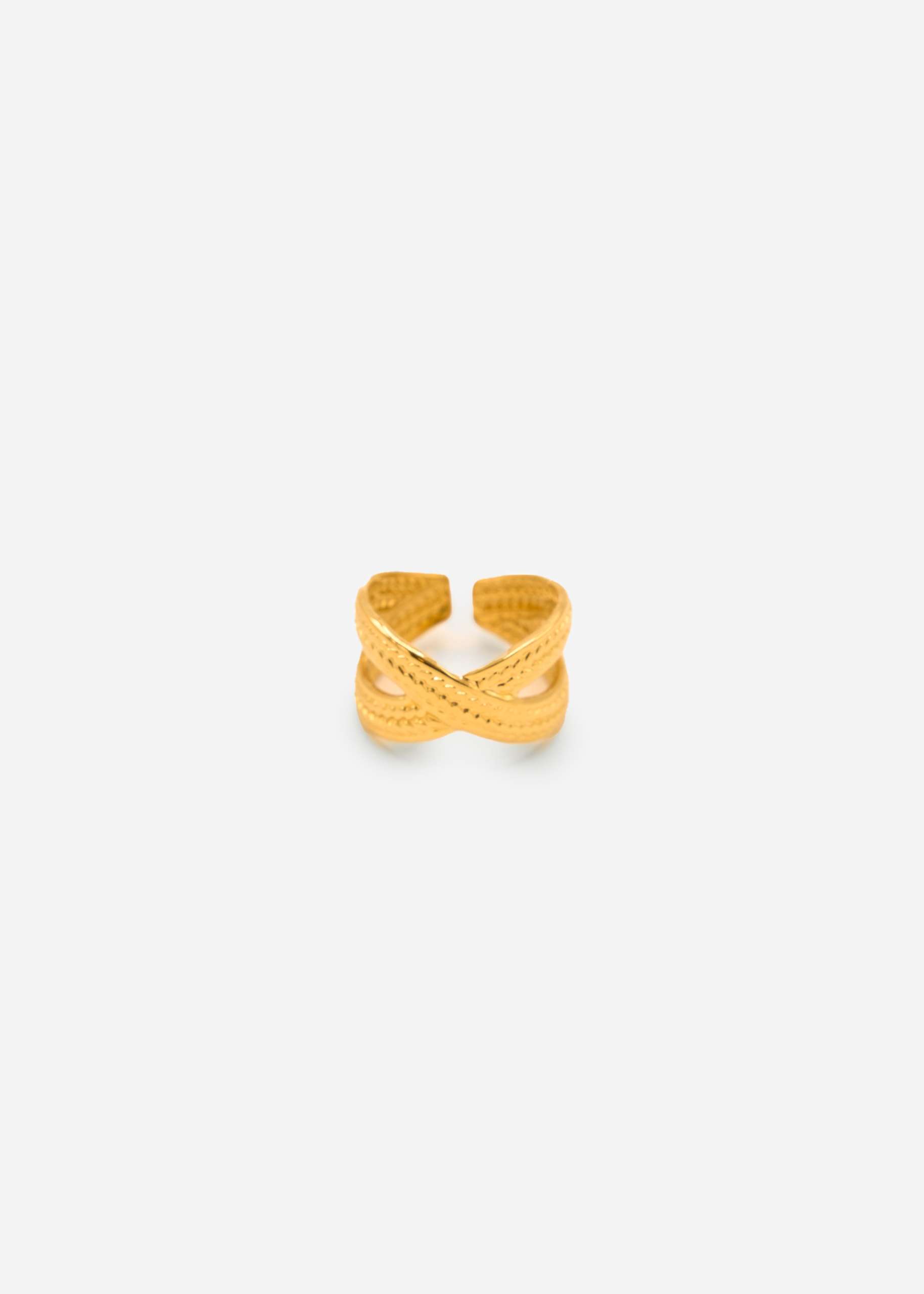 Crossed ring with texture - gold