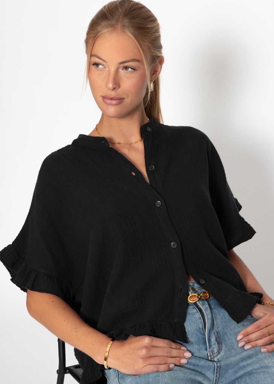 Muslin blouse with ruffle hem - black