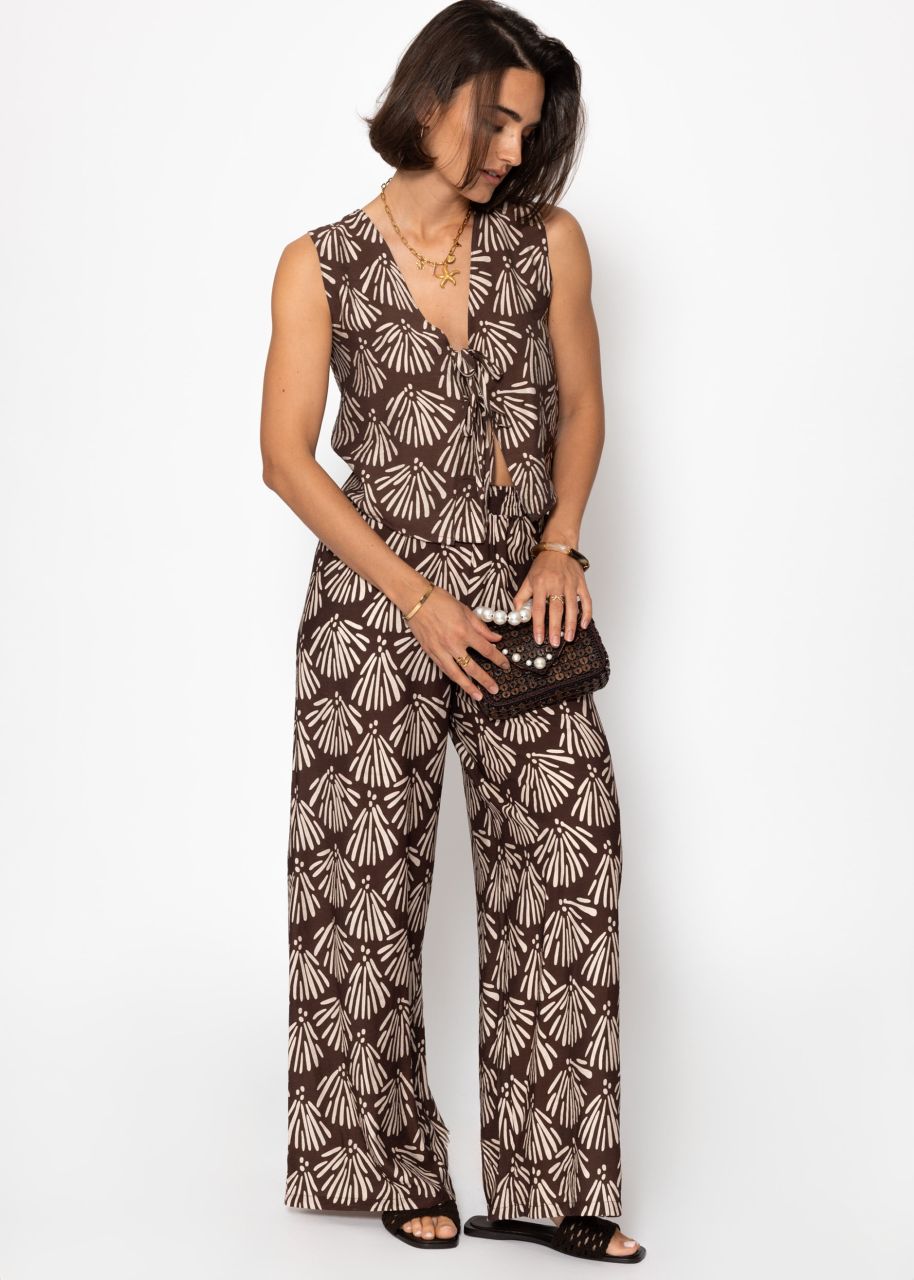 Slip-on trousers with shell print - brown