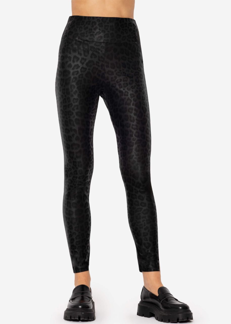 Faux leather leggings with leo print - black