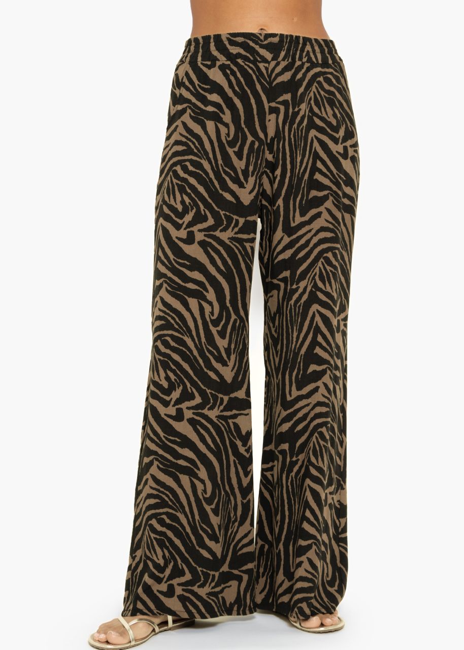 Viscose slip-on trousers with zebra print - black-brown