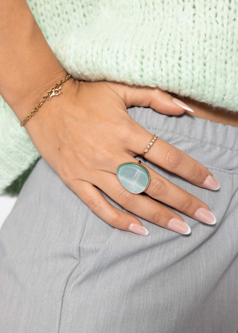 Ring with light blue gemstone - gold