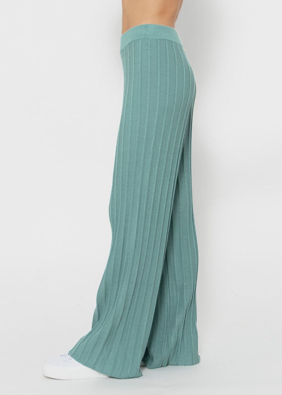 Flowing knitted trousers with ribbed structure - green