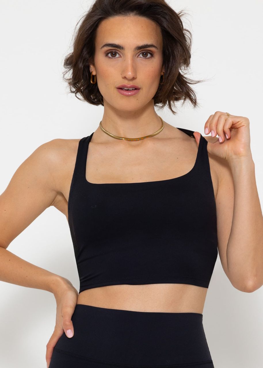 Sports bra with crossed, wide straps - black