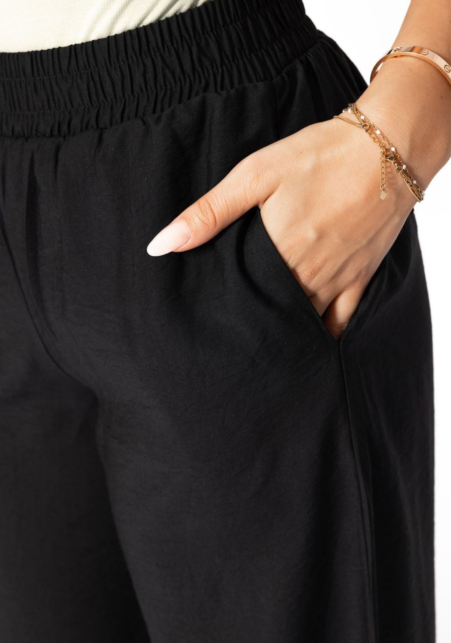 Shiny fabric trousers with straight leg - black