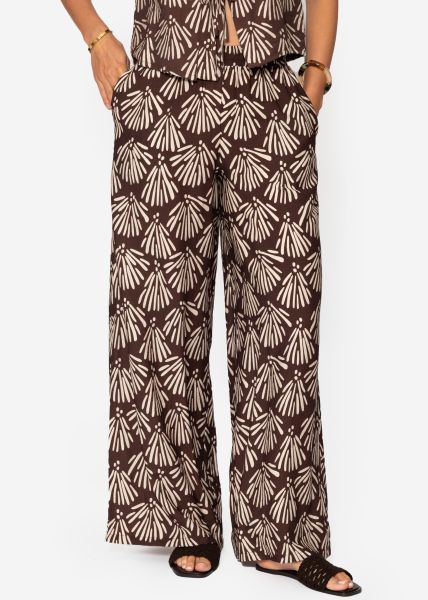 Slip-on trousers with shell print - brown