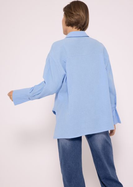 Muslin blouse with asymmetrical hem, blue