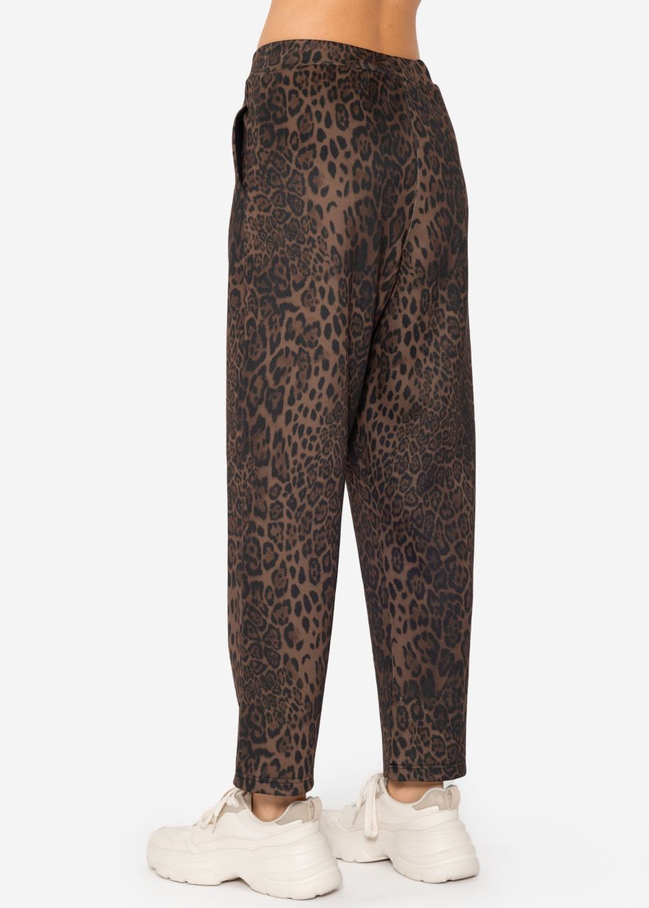 Soft jogging trousers with leo print - black-brown